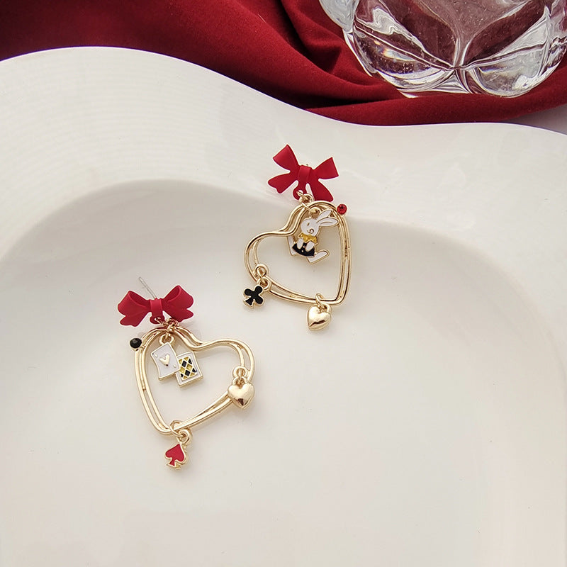 Women's Needle Hollow Heart Asymmetric Bow Style Earrings