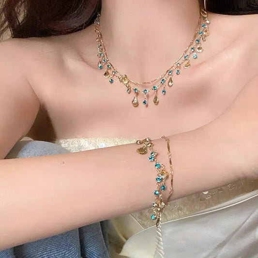 The Sea Blue Zircon Gold Shell Niche Bracelets