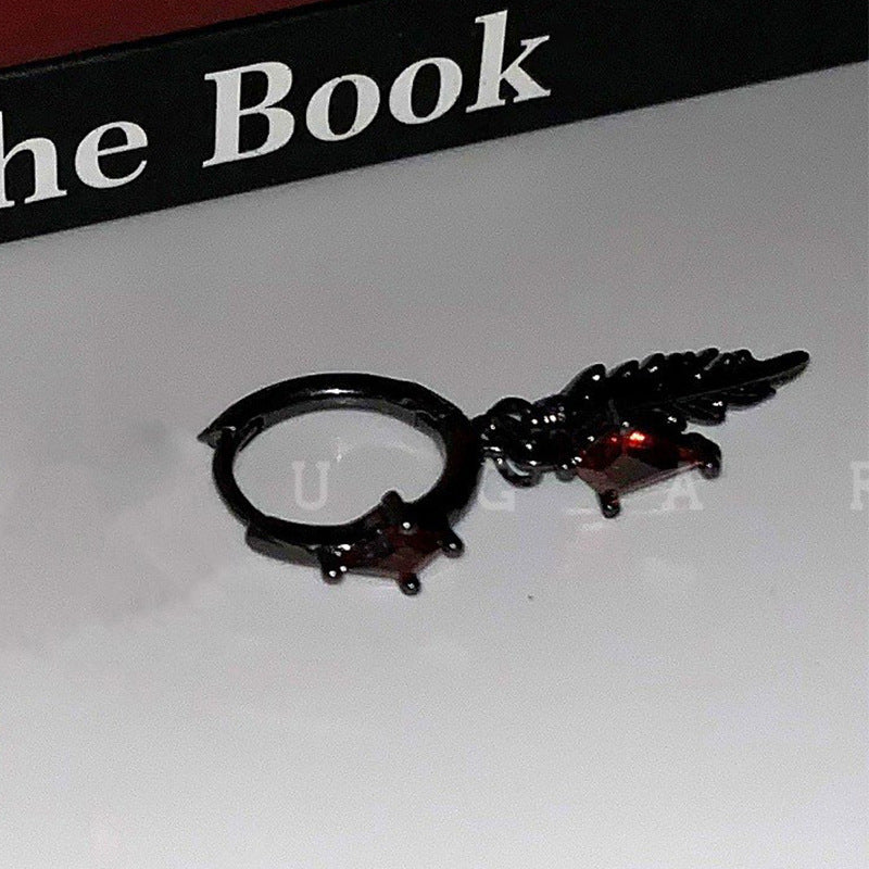 Crow Black Ear Bone Titanium Steel Screw Red Zircon Rings