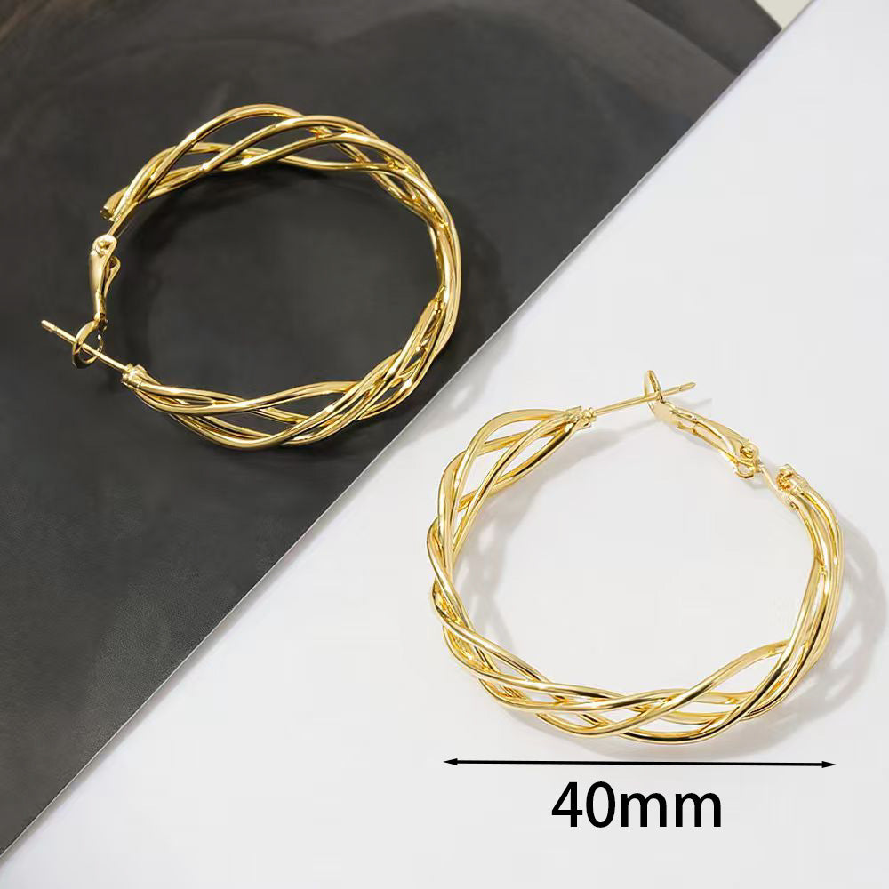Retro Hollow Twist Hoop Special Interest Light Earrings