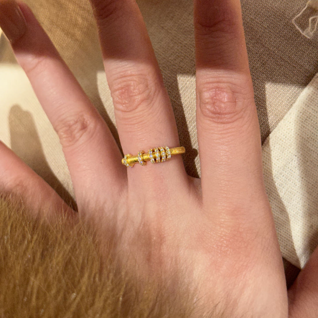 Interlocked Italian Craft Brushed Spot Drill Gold Flexible Female Light Rings