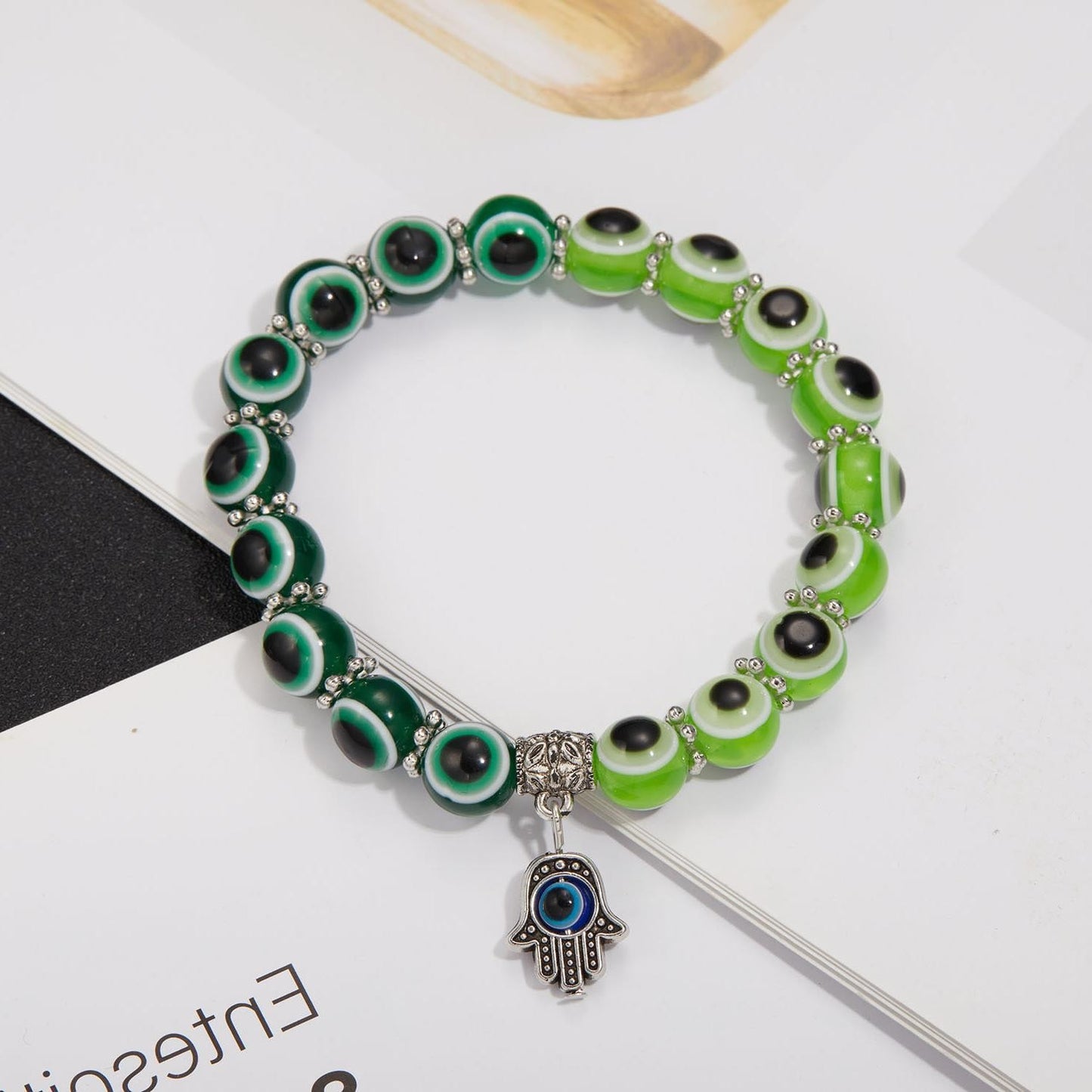 Alloy Palm Hollow Blue Eyes Beaded Elastic Bracelet